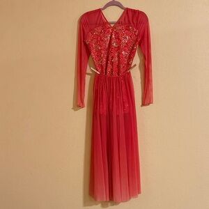 Coral sequence and sheer dance costume with long sheer skirt.